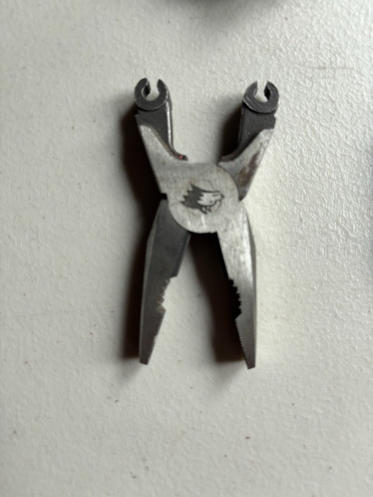 Wolf Multi-Pliers, Wire Cutter & Belt Loop Holder with smaller blue Multi-pliers