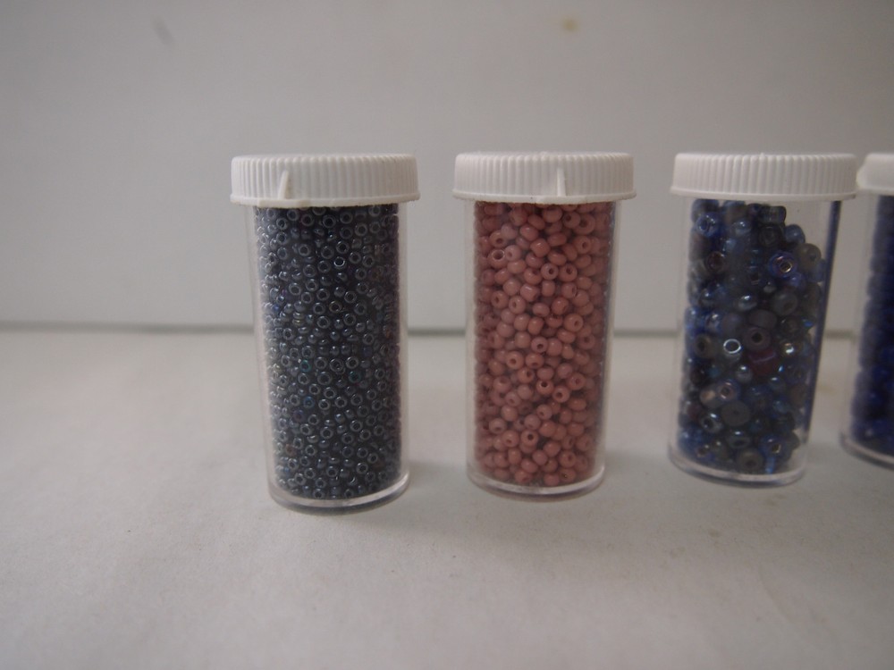 ASSORTED BEADS IN PLASTIC CONTAINERS