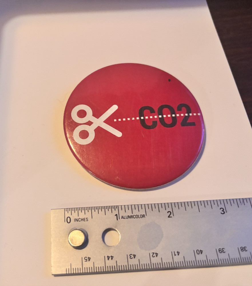 cut carbon dioxide political button unknown origin