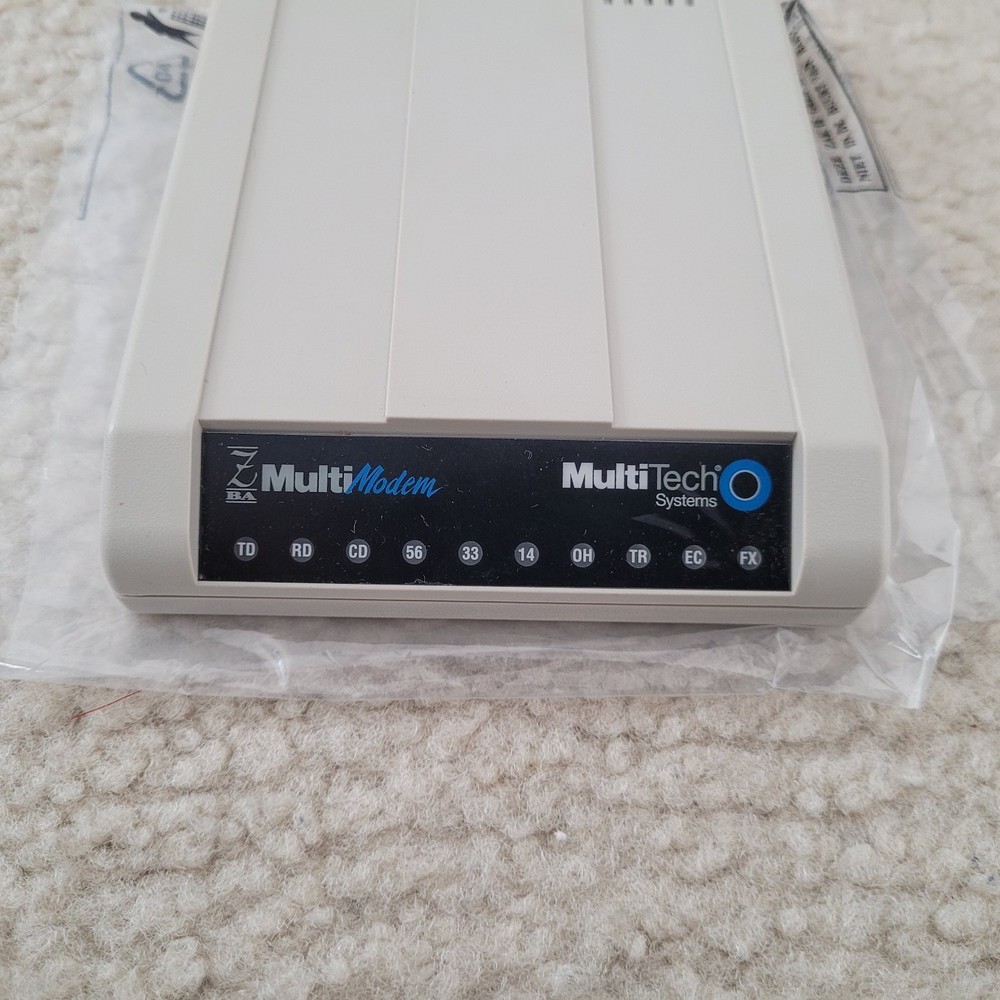 Multitech Systems Multi Modem Model: MT5634ZBA 56Kbps Data/Fax with accessories.