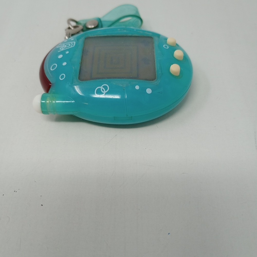 Tamagotchi 2004 Teal Melon Soda TESTED WORKS!