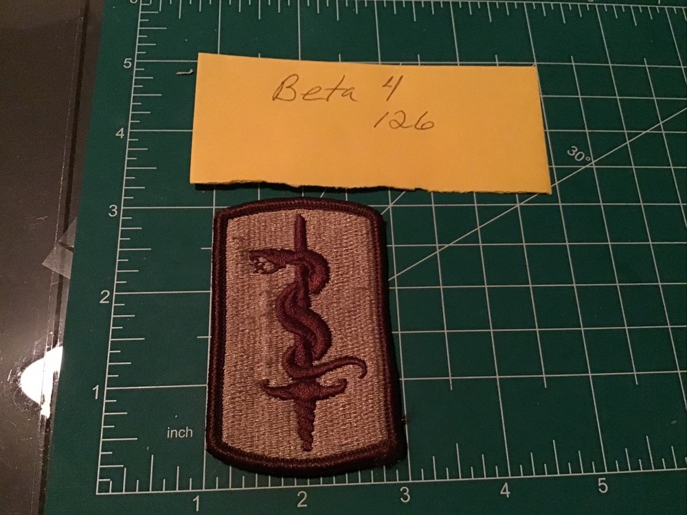 Army Patch: 30th Medical Brigade - tan, merrowed edge