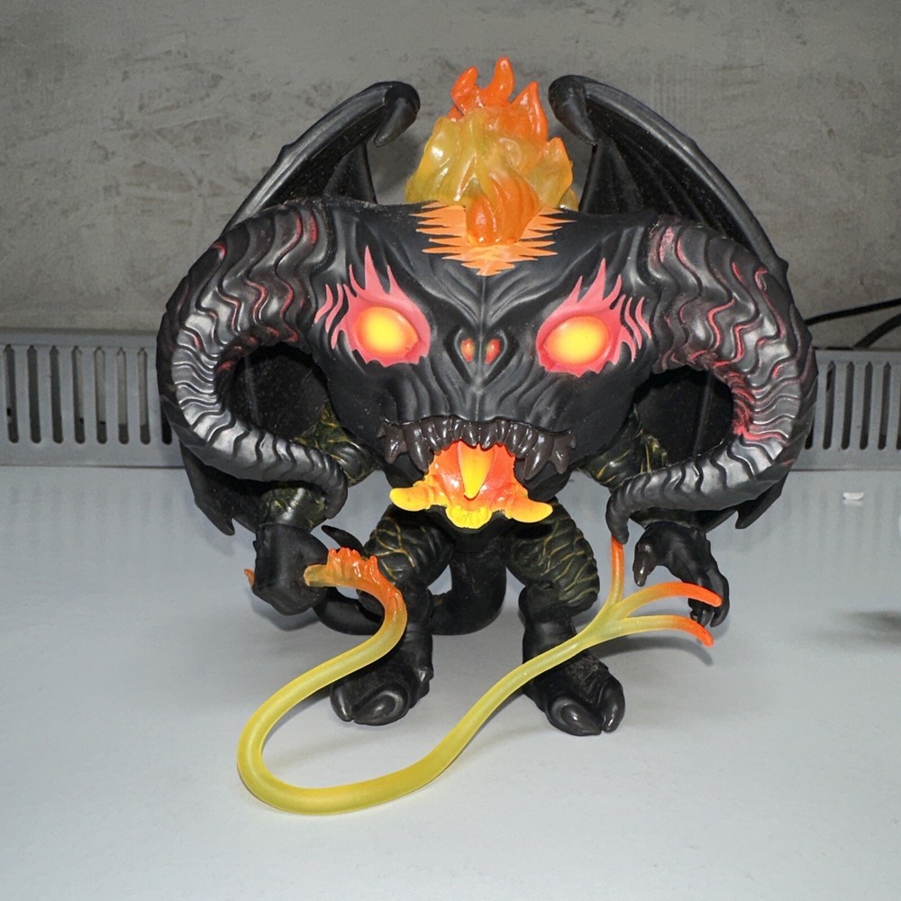 bobblehead demon with fire rope
