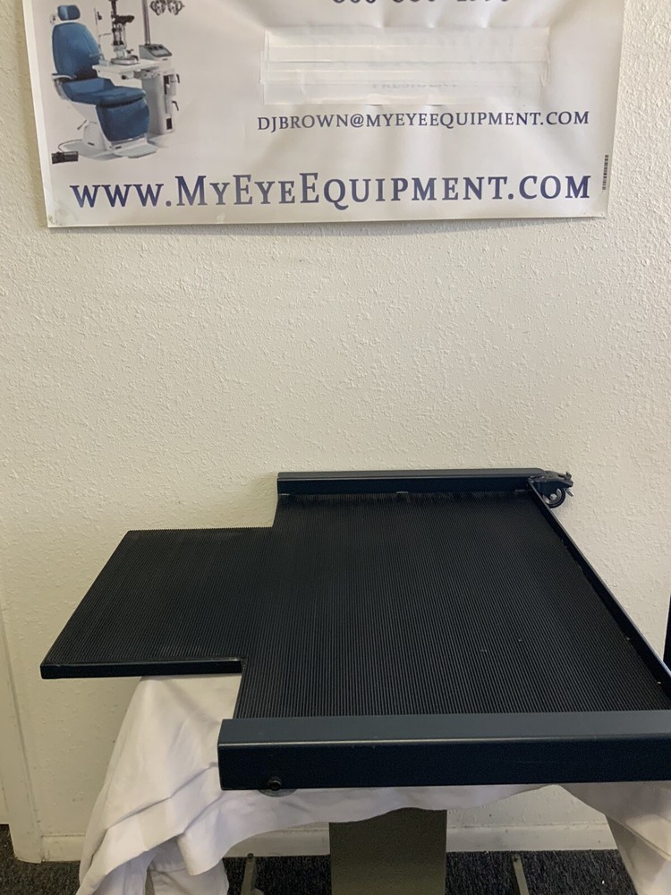 Ophthalmic Chair mover. TOPCON