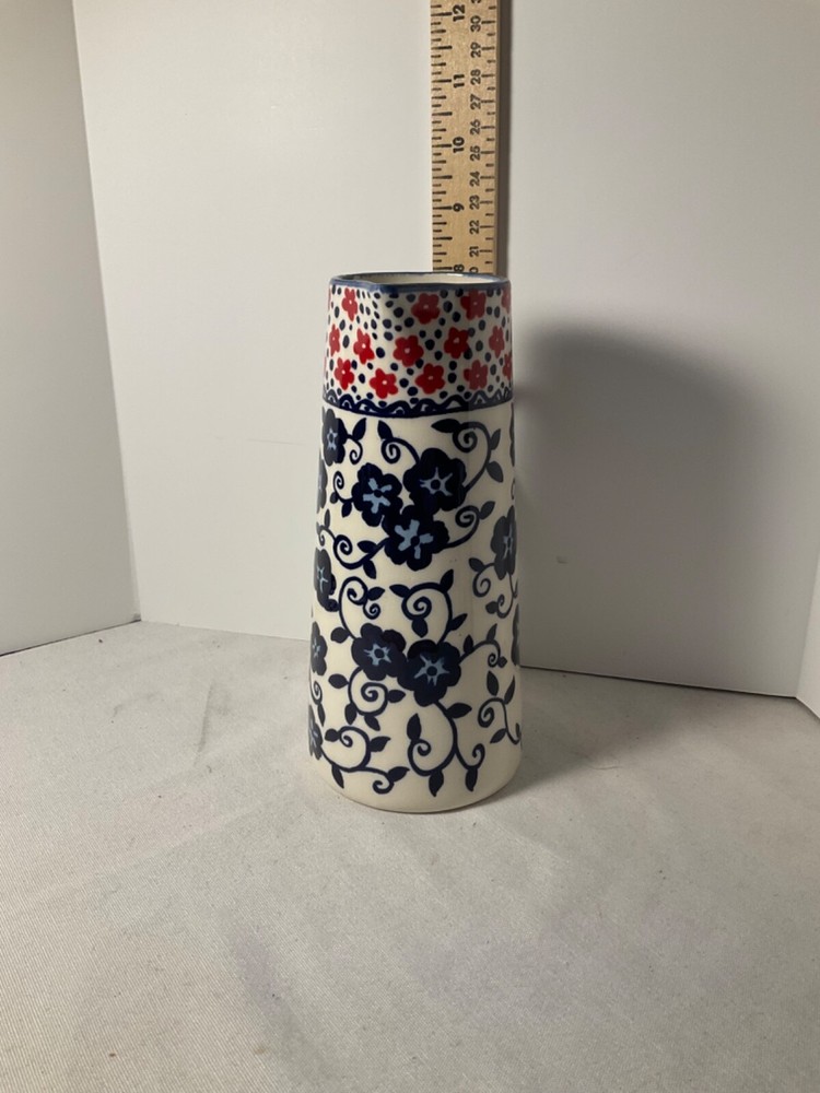 Decorative blue and red flowered pitcher 8”