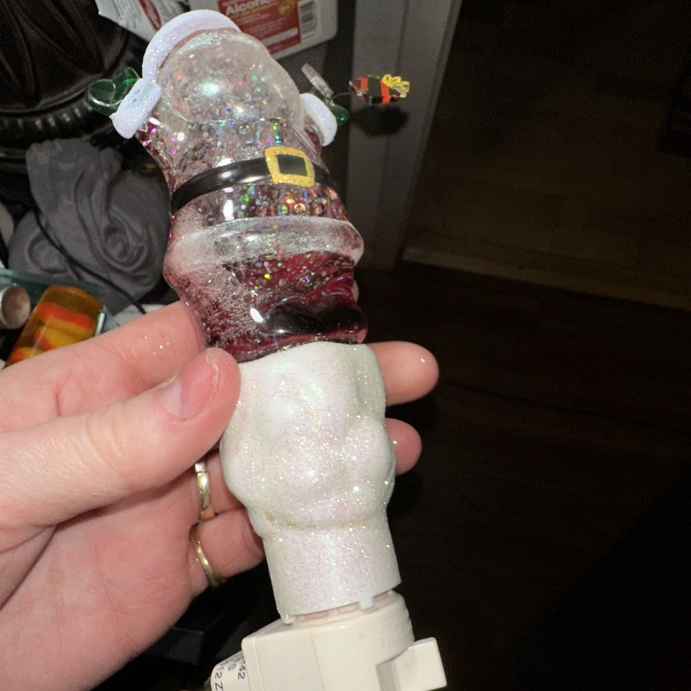 Santa night light with Jingles over his head