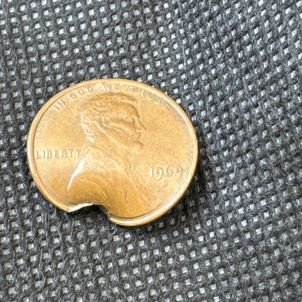 1969 D Penny with Bullet Damage