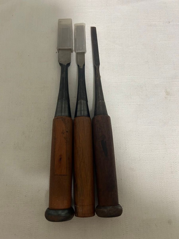 There are small stains and scratches.