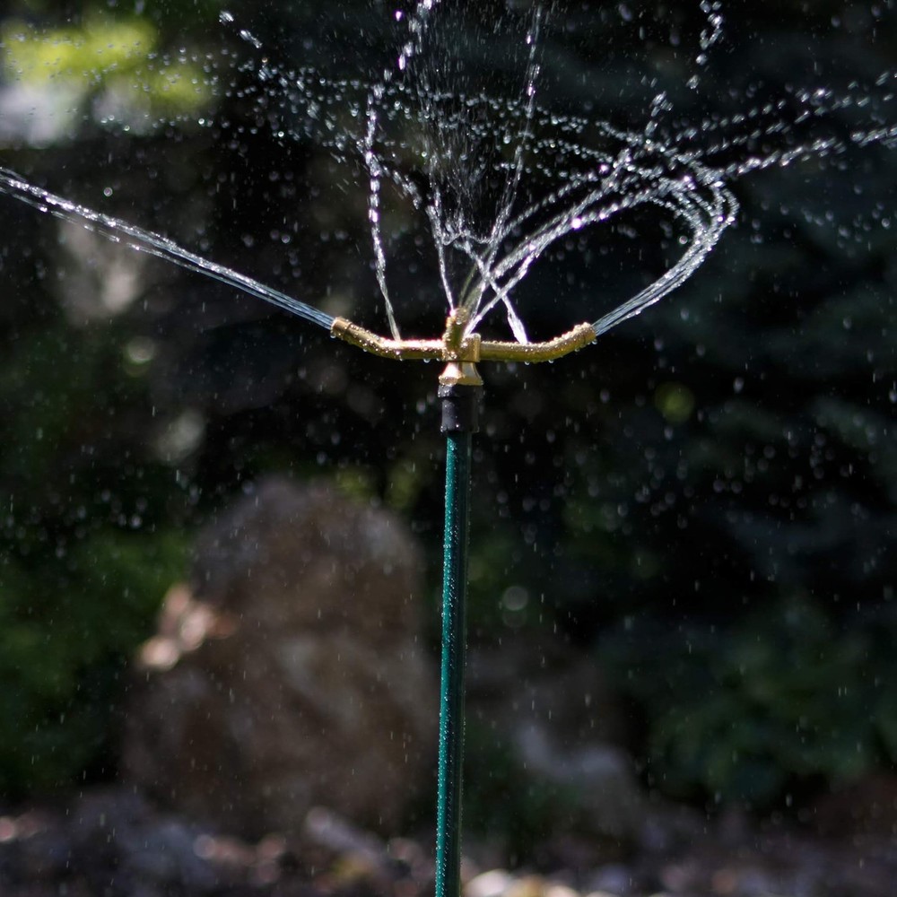 Orbit 3-Arm Rotating L awn Sprinkler on Adjustable Step Spike
