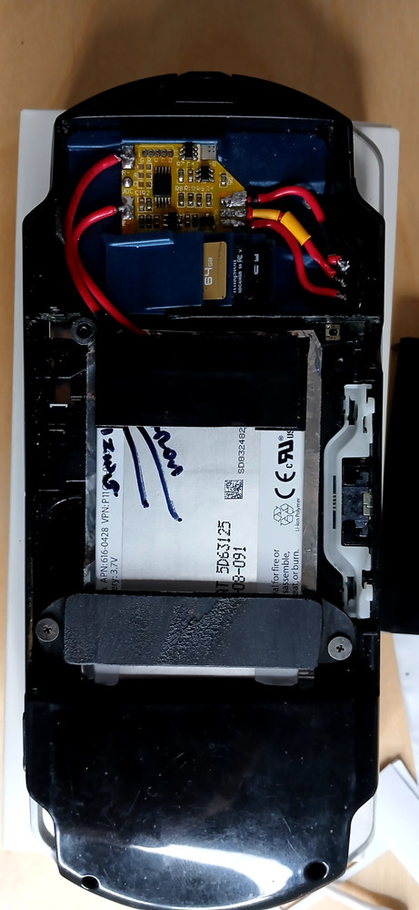 PSP 2000/3000 battery tray with microSD storage for battery modification fix.
