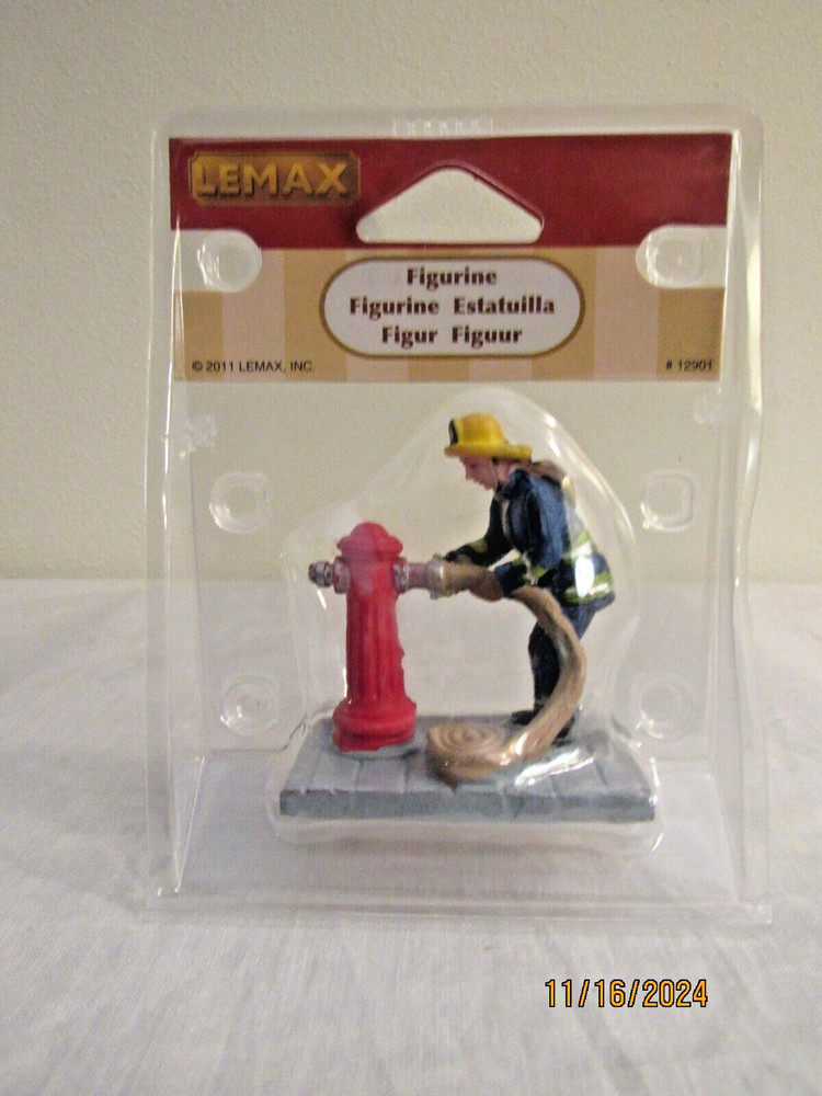 2011 LEMAX FIRFIGHTER FIGURINE #129017281