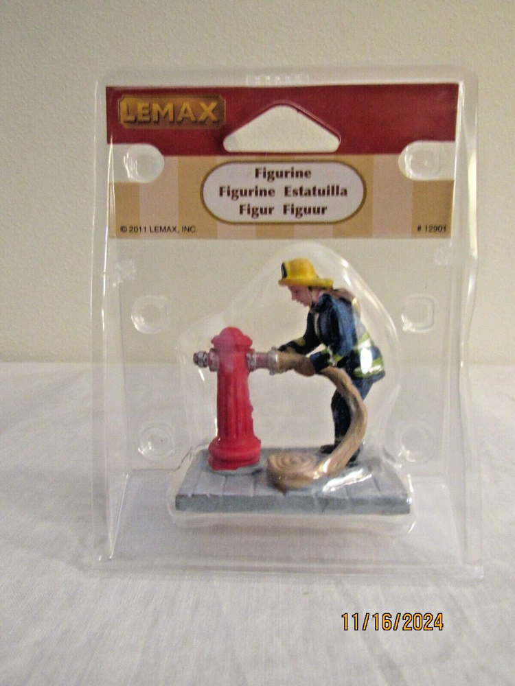 2011 LEMAX FIRFIGHTER FIGURINE #129017281