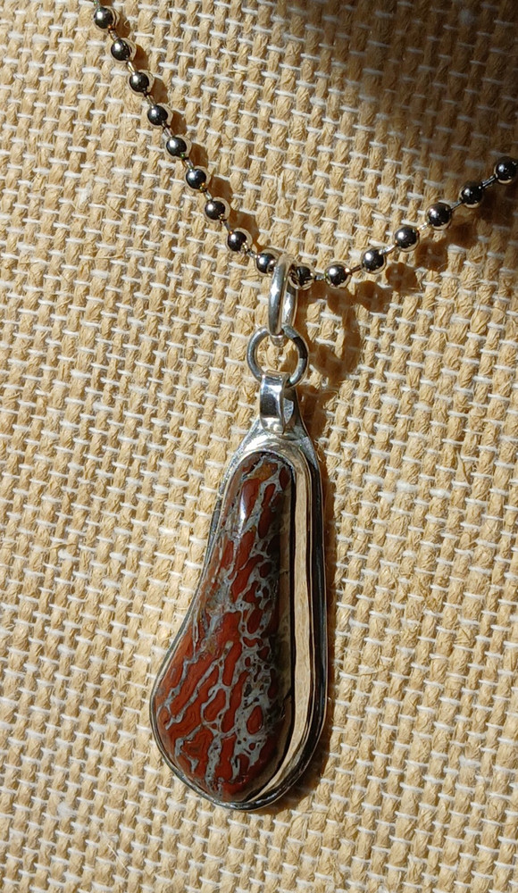 Dinosaur Bone Cabochon - Red Cells - Set in Sterling Silver