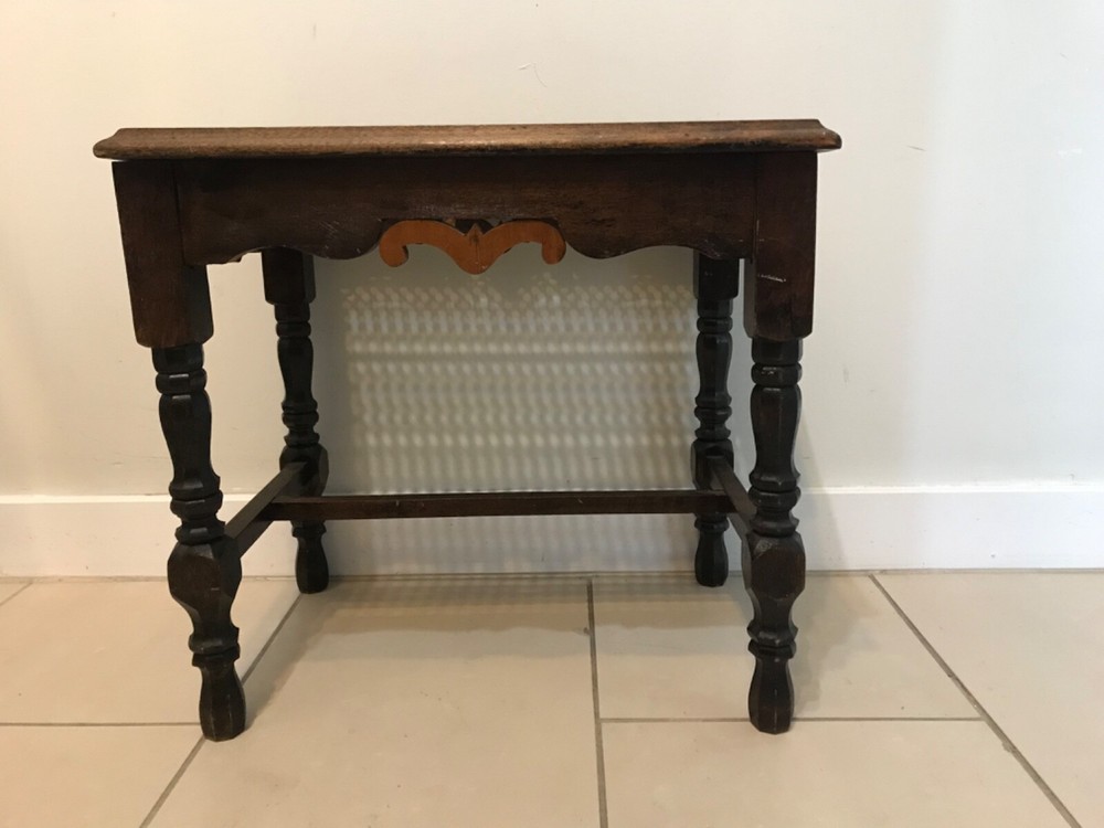 Caned-top footstool, ottoman or seat.