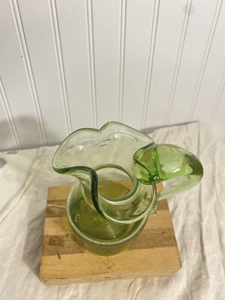 green glass pitcher vintage