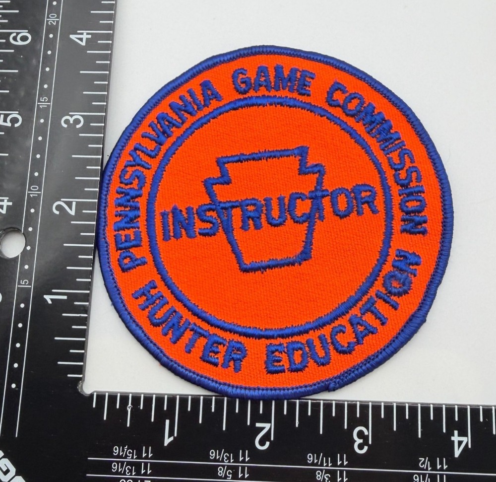 Pennsylvania Game Commission Instructor Hunter Education Round Orange Blue