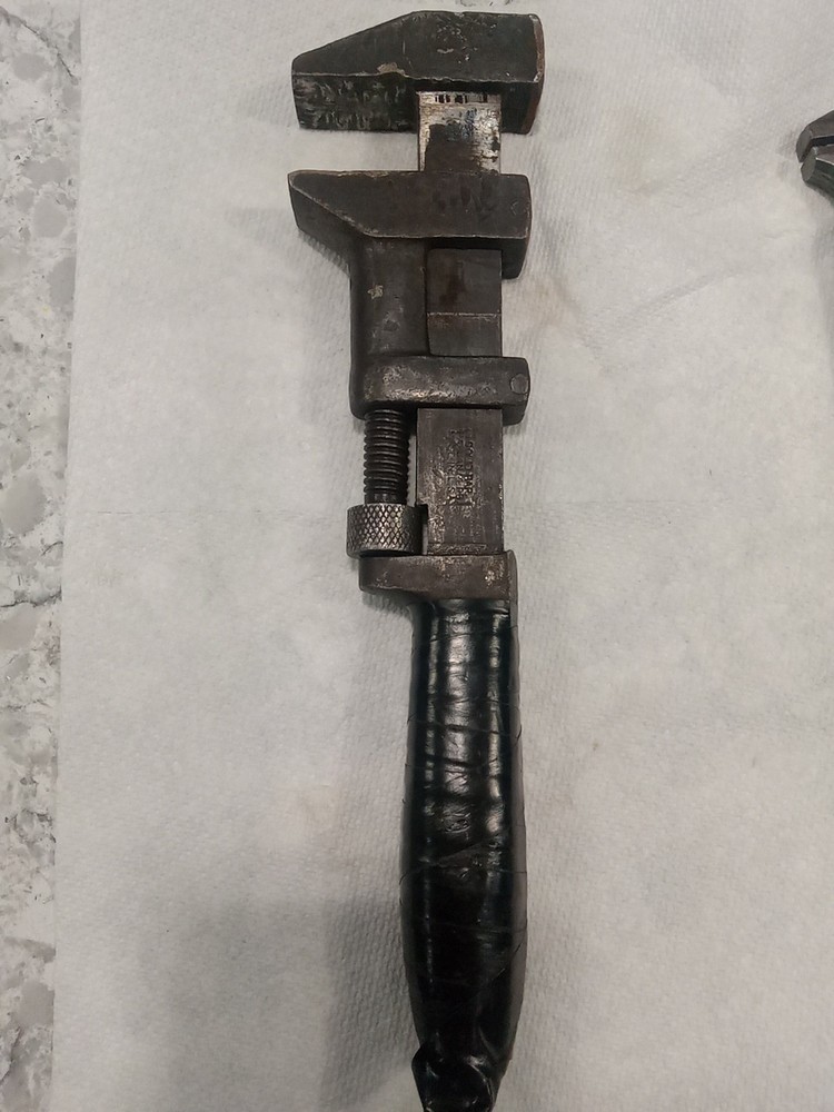 Vintage Monkey Wrech Measures 12 Inches Long.  Handle Is Taped.