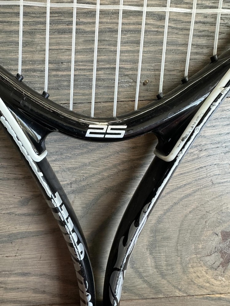 Wilson Tennis Racquet with Red String Pattern