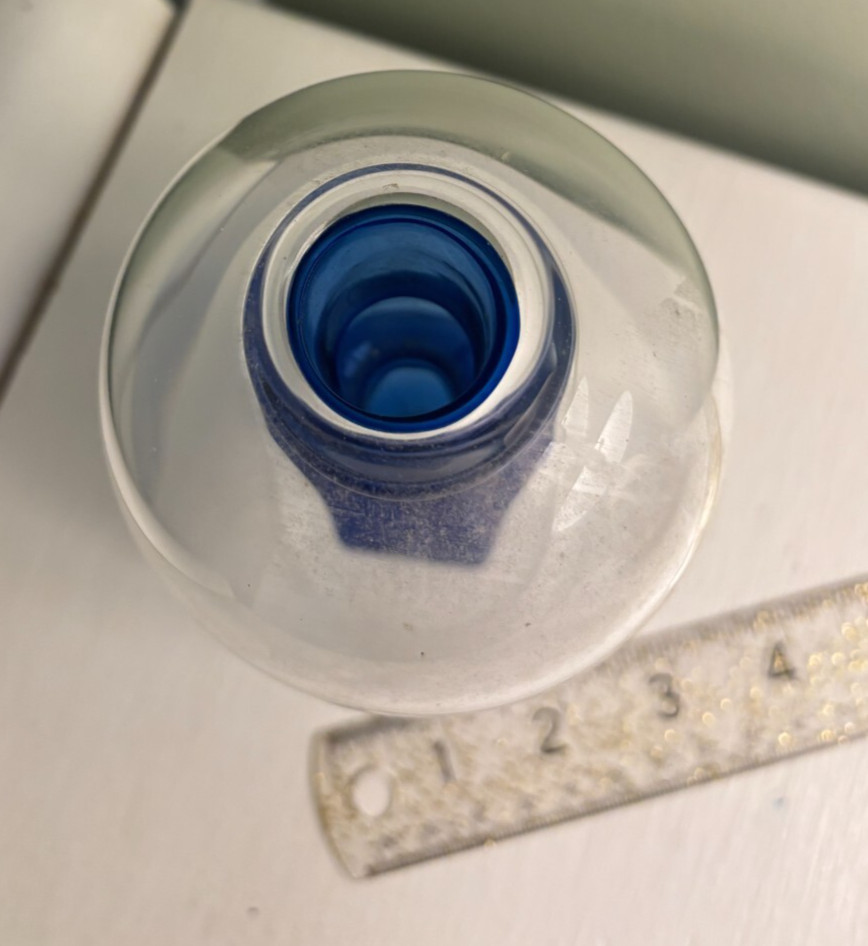 Bud vase? Blue glass inside clear dome