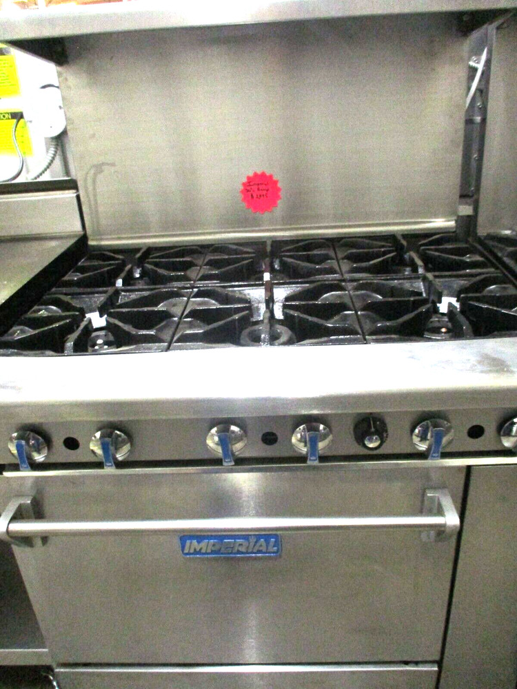 USED IMPERIAL 36" L RANGE WITH 6 BURNERS & STD OVEN, NAT GAS.