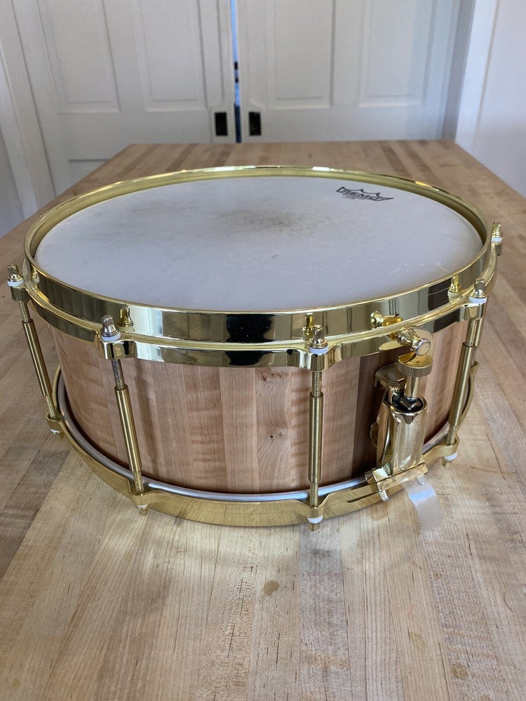 5 1/2 x 14 Custom made snare drum. Curly Maple Stave shell.