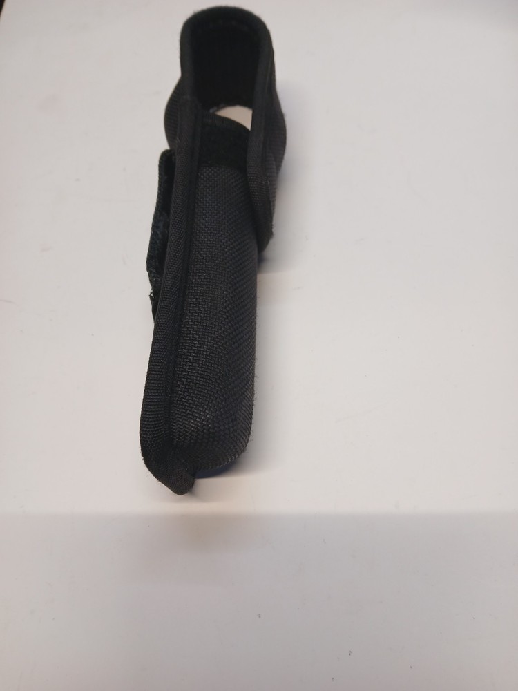 BIANCHI BLACK FLASHLIGHT HOLDER WITH BELT LOOP.