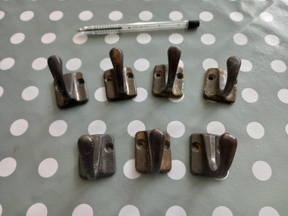 Reclaimed brass coat hooks