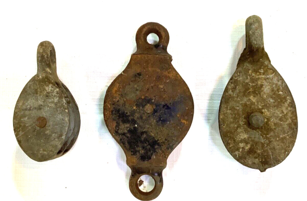 3 Vintage small metal pulleys
