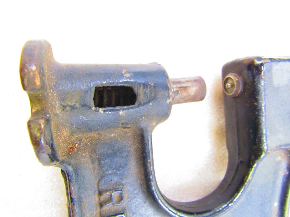 Vintage cast iron grommet/rivet macine by Rex