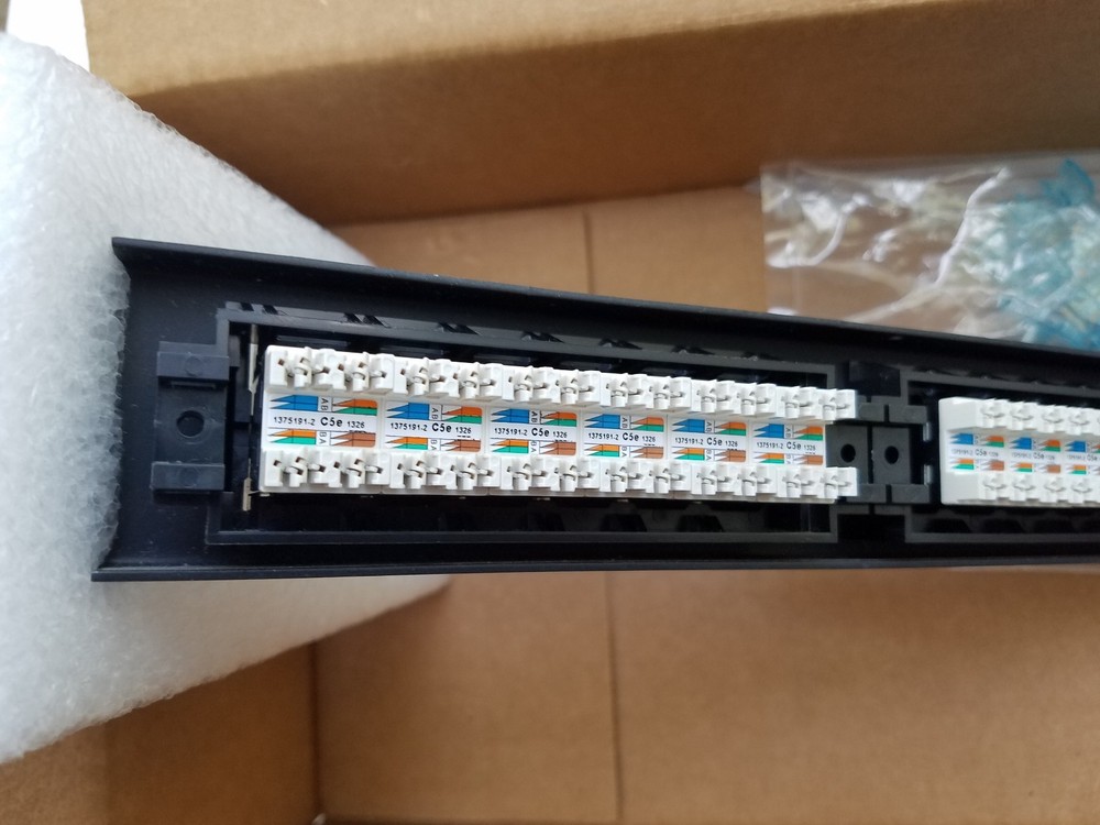 AMP 1499602-2 SL Series Patch Panel Cat5E Unshielded 24-Port Angled 1U