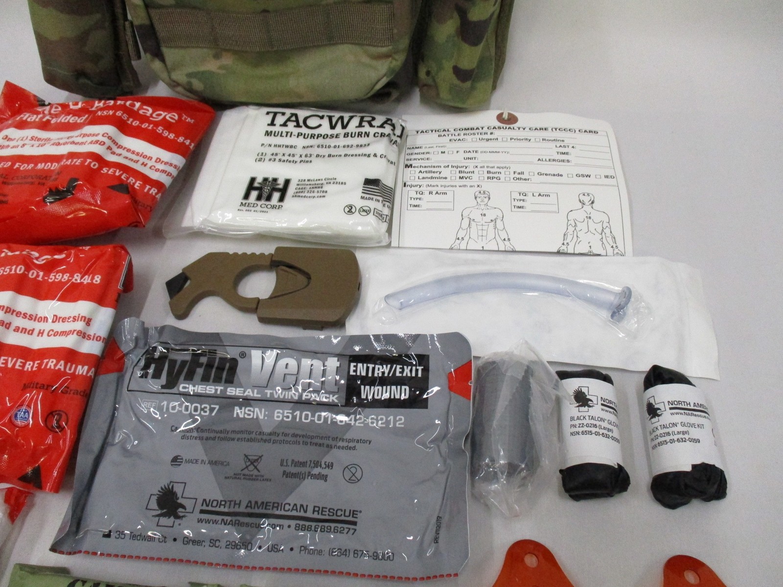 USGI IFAK GEN 7 CAT TOURNIQUET QUIKCLOT BANDAGE DRESSING IFAK FIRST AID MULTICAM