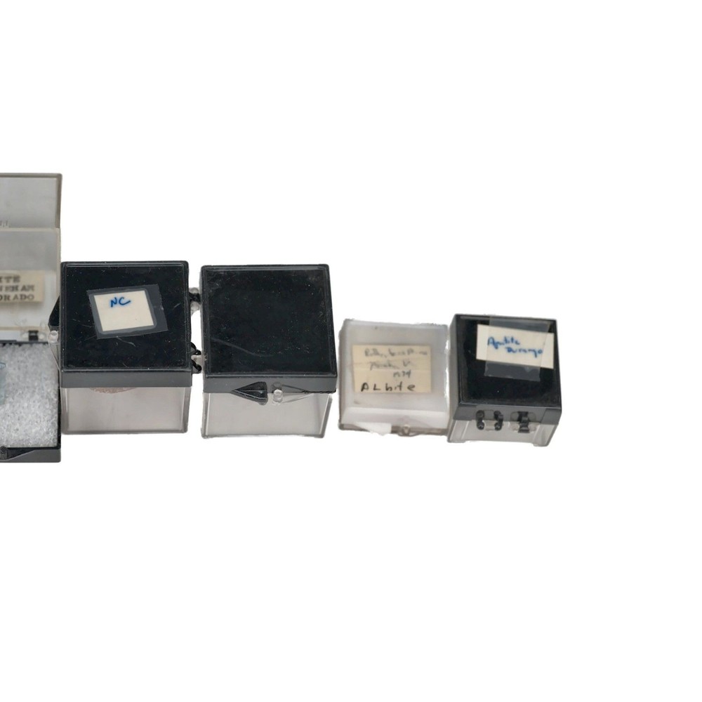 Assorted Mineral and Crystal Specimen Collection in Display Cases