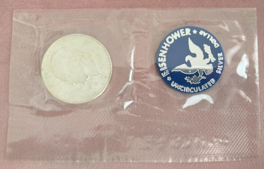1971 Eisenhower Uncirculated Silver Dollar coin with envelope