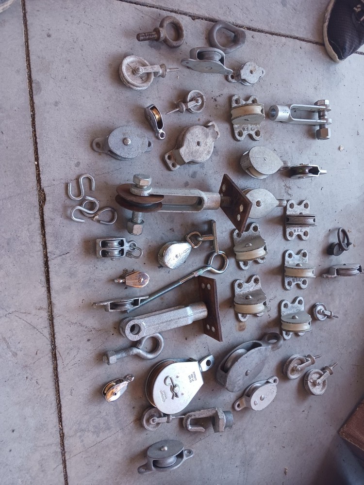 Collection Of Misc Small galvanized Rope-cable pulleys and hardware.