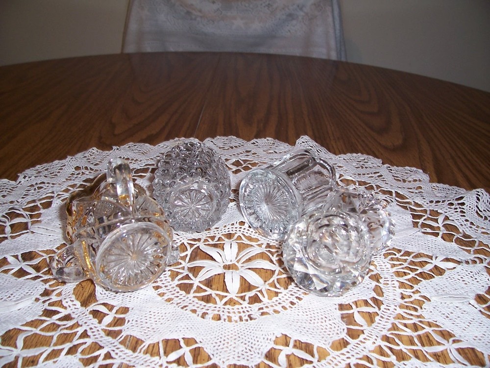 FOUR NICE GLASS TOOOTHPICK HOLDERS