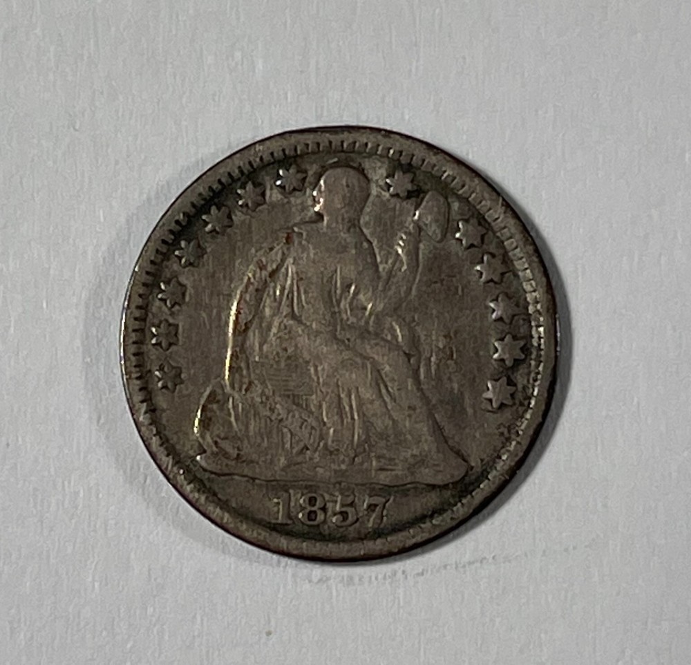 1857 1/2 10C (#20129) VF cleaned