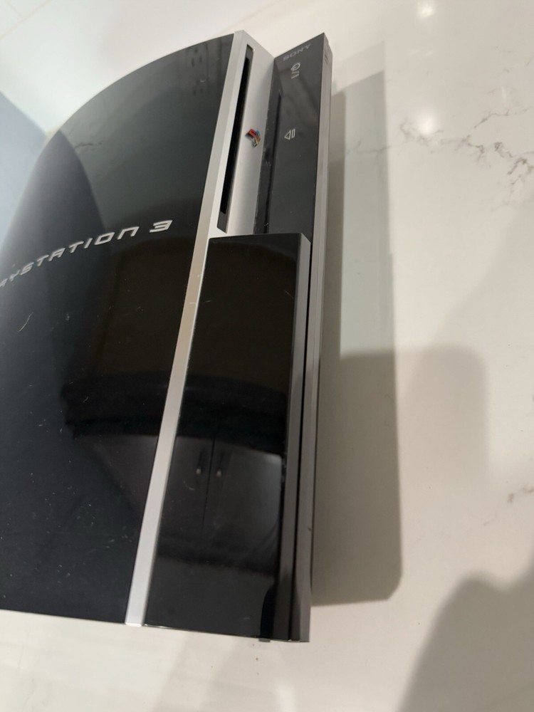 Sony PlayStation 3 with Controller, Power Cord, And Remote