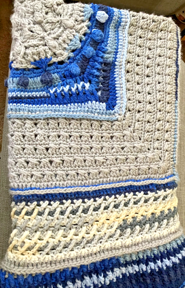 handmade, textured crocheted afghan