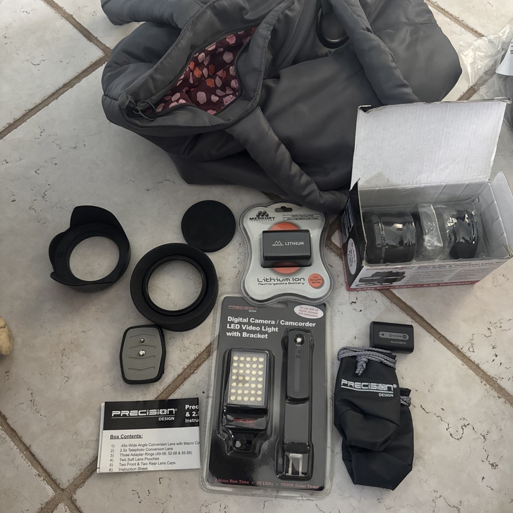 New and used camera accessories lot