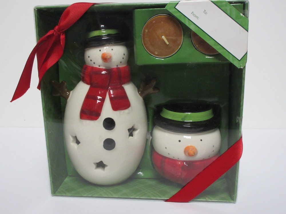 HOLIDAY TIME SNOWMAN TEALIGHT SET 4 PC. NEW IN PKG.