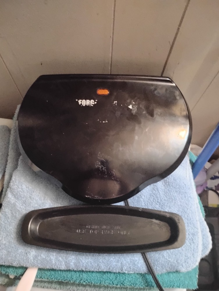 black george foreman grill with drip tray used