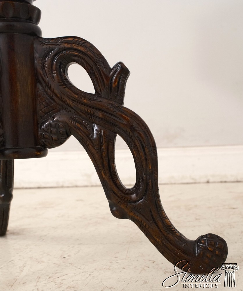 F68248: Black Forest Style Carved Pedestal Table
