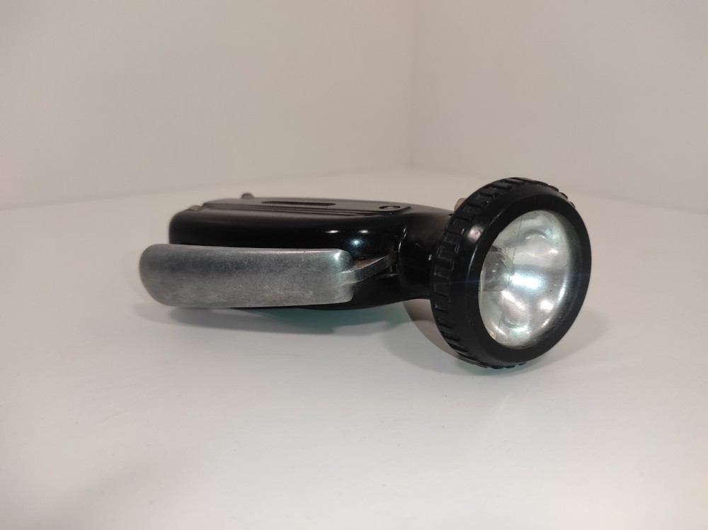 Soviet electrodynamic flashlight called "Zhuchok." "B-44."
