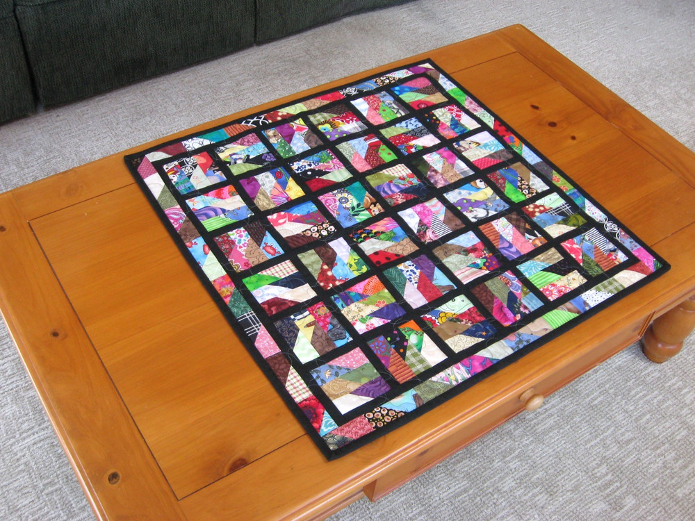 Quilted Table Topper, Scrappy Rectangles, Black Sashing