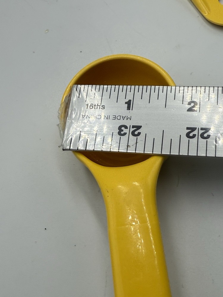 Carlisle 1 Oz. Yellow Long Handle Portion Spoon
