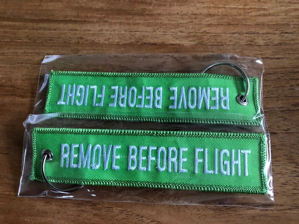 REMOVE BEFORE FLIGHT embroidered keychain Green color
