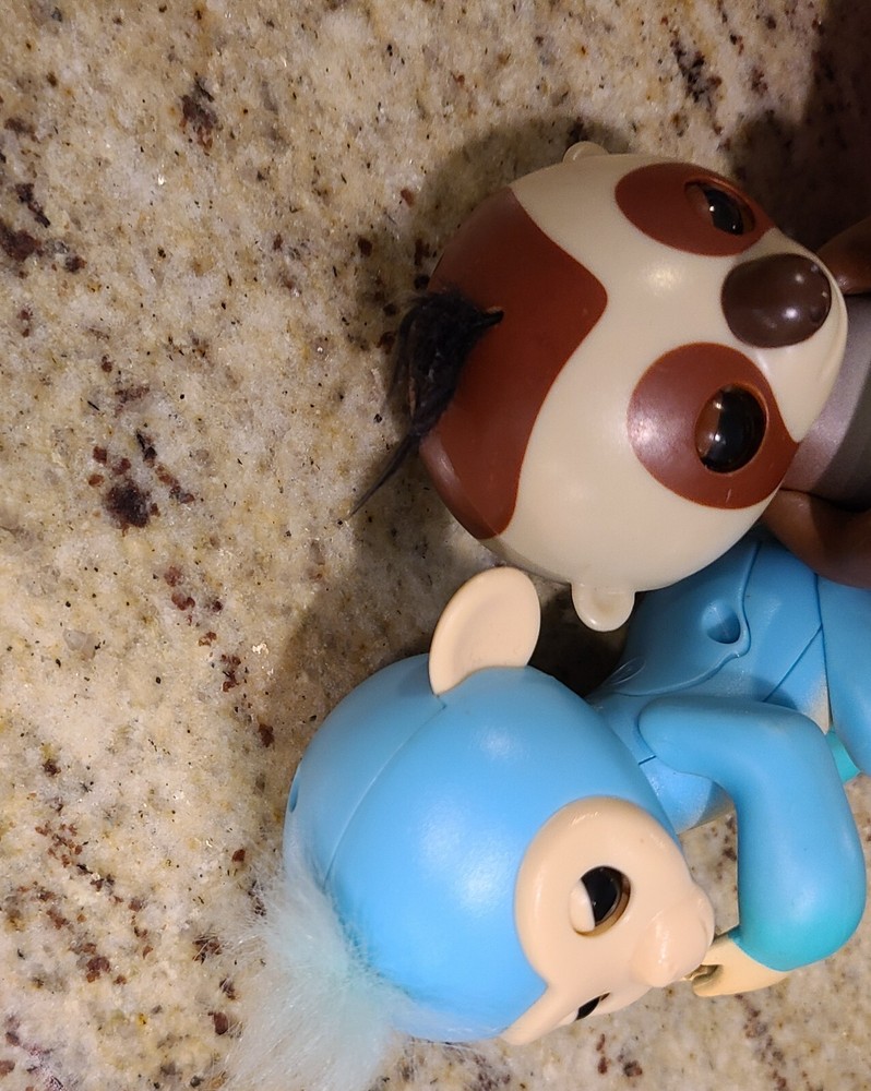 2 Fingerlings Interactive Baby Monkey Blue Brown Toys. Both work tested.
