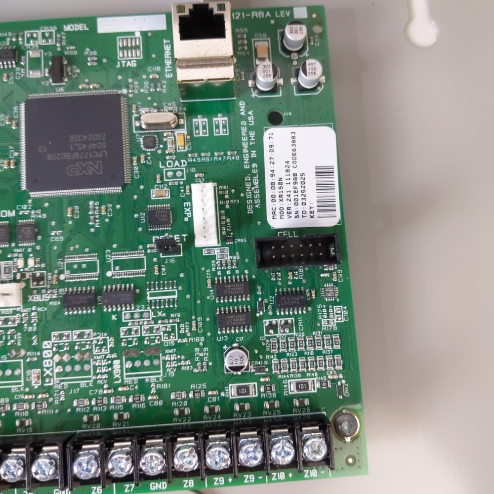 DMP XR150NL-G Network Panel Assembly and Accessories.