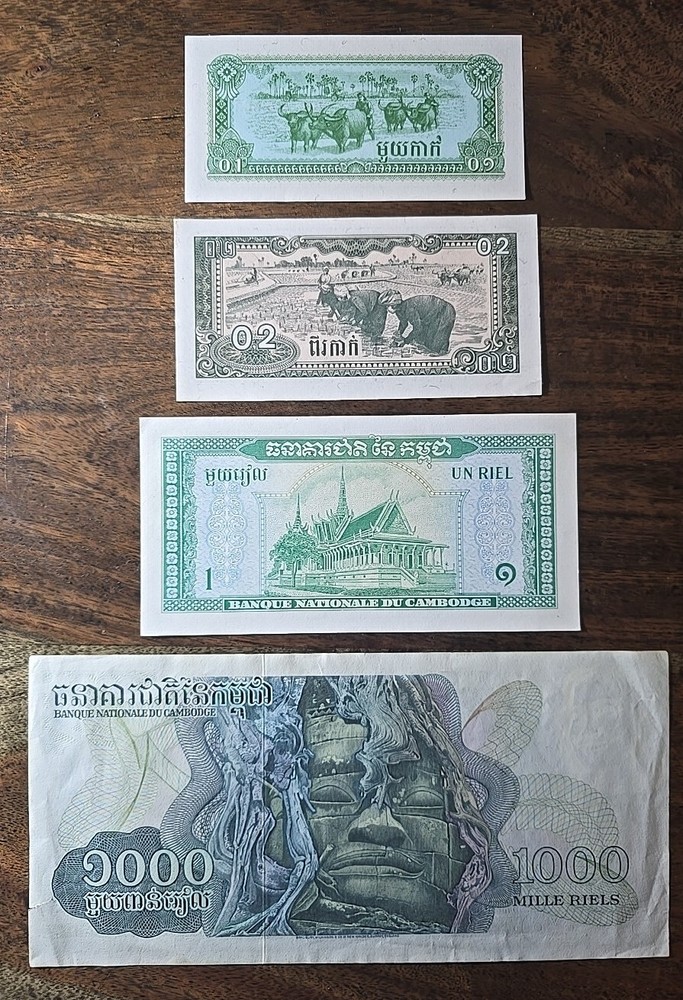 B47*Cambodia 4 BANKNOTES 3 UNC AND 1 VF+
