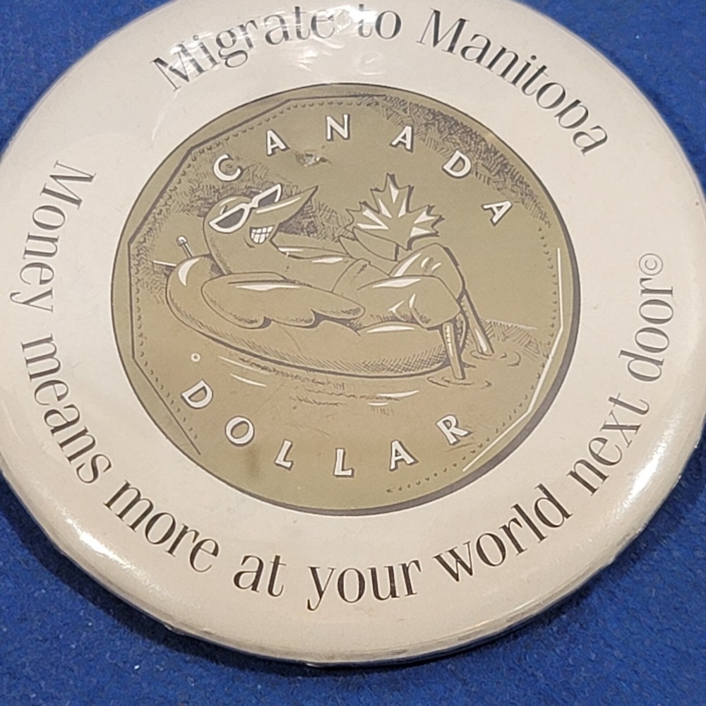 Vintage Migrate To Manitoba Canada pinback Button